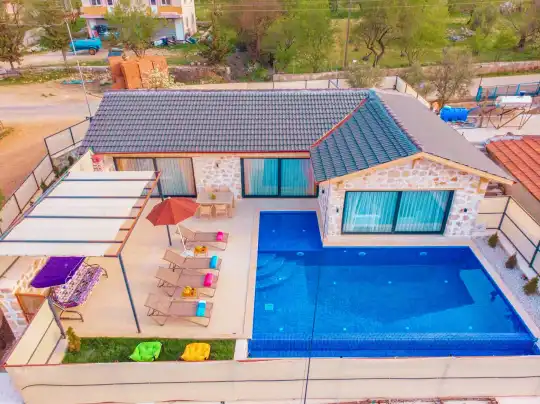 Kalkan'da Huzur ve Konfor Dolu Doğanın Güzelliğinde Rüya Gibi Tatil Villası
